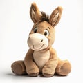 Cute brown donkey plush toy on white background. Royalty Free Stock Photo